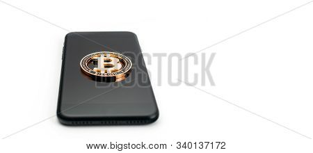 Bitcoin Wallet. Gold Cryptomoney With Black Smartphone Isolated On White. Litecoin, Ethereum Cryptoc