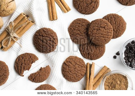 Closeup Of A Group Of Assorted Cookies. Chocolate Chip, Cinnamon, Cinnamon Sticks And Dark Chocolate
