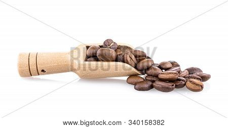 Fresh Coffee Beans In Wooden Spoon Ready For Rosted And Brew A Cup Of Coffee Isolated On White Backg