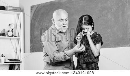 Back To School. Teaching Kid. Teacher Help Schoolgirl. Pedagogue Career. Educative Activity. Little 