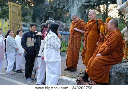 Buddhist Monk Teaching Dhamma To People