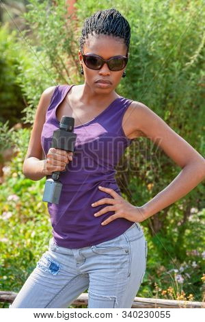 Reporter African woman with a microphone