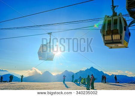 Russia, Glade Azau, Elbrus-january 20, 2019: Skiers And Snowboarders Relax