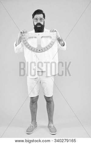 Maintain Beard Shape. Bearded Nerd With Protractor. Exploring Properties Of Protractor. Brutal Hipst