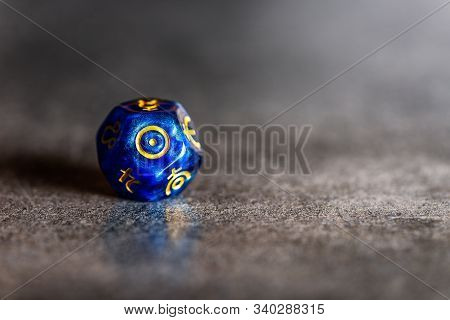 Blue Astrology Dice With Symbol Of The Sun On Grey Background