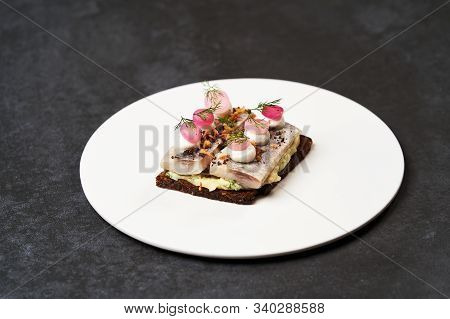Smorrebrod With Baltic Herring Fish, Smoked Mousse And Pickled Onions
