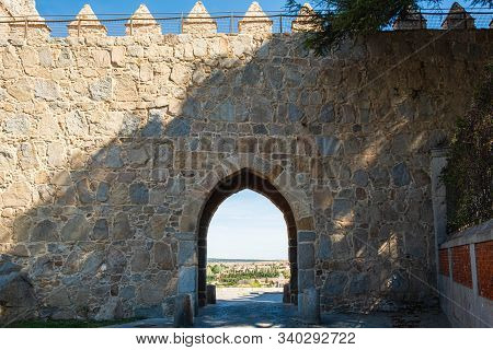 Walls Surrounding Spanish City Of Avila, Puerta Del Mariscal