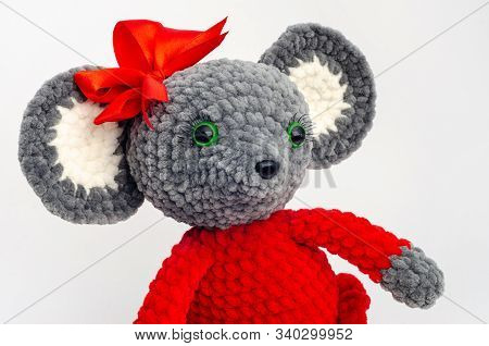 Portrait Of A Teddy Mouse With A Red Bow On Its Head
