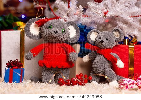 Two Homemade Plush Mice Under The Christmas Tree With Gifts