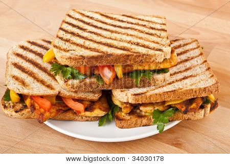 grilled chicken sandwiches on a plate