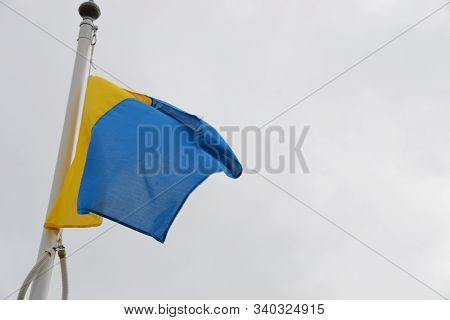 Flag Of County Clare Ireland On A Rainy Day
