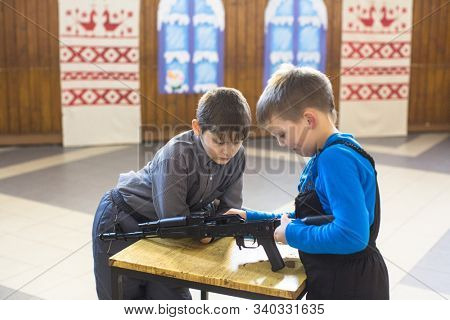 NIKOLSKY, RUSSIA - JAN 19, 2018: Training of children to use weapons in the framework of revival program of the Cossacks in the Leningrad region. Cossacks in St.Petersburg began its revival in 1990.