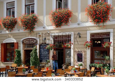 CLUJ NAPOCA, 26 SEPTEMBER 2019: A typical street view in the old center of Cluj Napoca, Romania                               