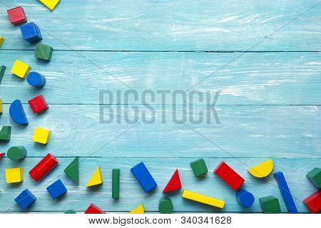 Kids Educational Developing Toys Frame On White Background. Top View. Flat Lay. Copy Space For Text