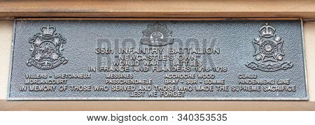 Newcastle, Australia - December 10, 2009: Closeup Of Black Metal Plate Remembering Battles In Flande
