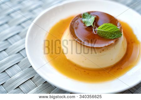Pudding Caramel Custard With Top View Of A Creme Caramel, Caramel Custard Or Custard Pudding In Whit