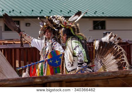 Custer, South Dakota - June15, 2014: Two Native American Men In Tribe Specific Clothing Performing I