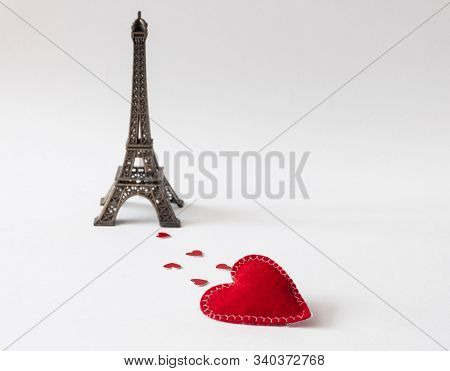 hearts and a poster on effel tower background. Space for text. 