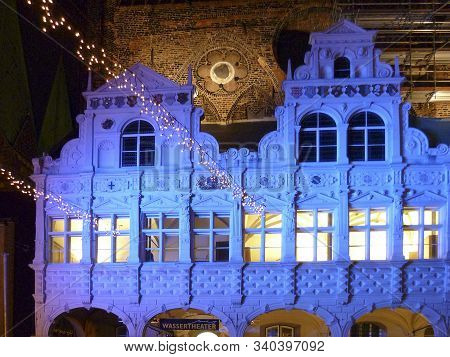 Luebeck, Germany - Jan 2, 2010: Facade Of Townhall In Luebeck By Night Illuminated In Blue.