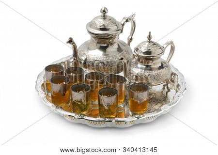 Moroccan tea tray with two teapots with and without sugar, and glasses with and without absinthium herb 
