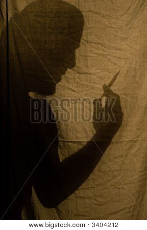 주사기와 그림자