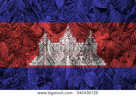 Cambodia Flag Depicted On Many Leafs Of Monstera Palm Trees. Trendy Fashionable Backdrop