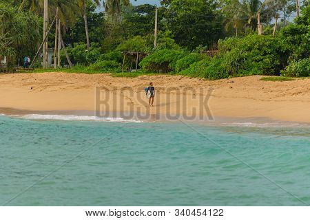 Midigama, Sri Lanka : 2019 Nov 18 :  People Surfing The Beach Whit Golden Sand In Midigama, Sri Lank
