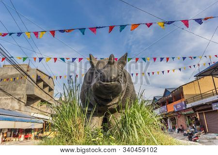 Sauraha, Nepal - November 09, 2019: Sculpture Of A Rhinoceros In Main Street Sauraha, Nepal