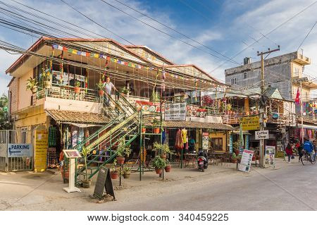Sauraha, Nepal - November 09, 2019: Shops And Restaurants In Main Street Sauraha, Nepal