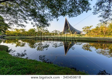 Nakhonpathom , Thailand - 18 Dec, 2019: Prince Mahidol Hall Building Of Mahidol University With Refl