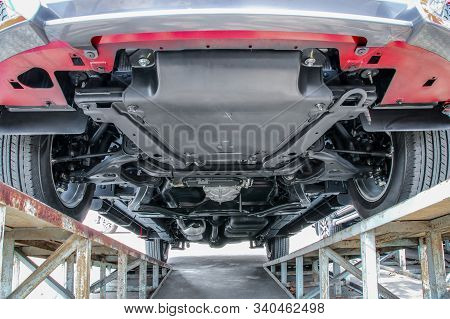 Bottom View Suspension And Chassis Of Red Car
