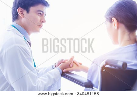 Doctor Visit Patient Telling Patient That She Gets Cancer. Doctor Comforting, Consoling, Encourage B