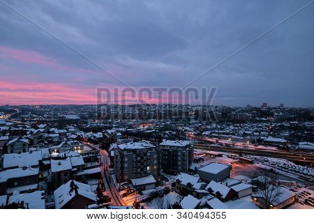 Beautiful Winter View Of Houses And Buildings With Roofs Covered With Heavy Snow. In Snowy Season, R