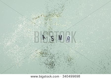 Top View Concept Of Asmr Sound Recordings - Sign On The Mint Table And Gold Glitter Around
