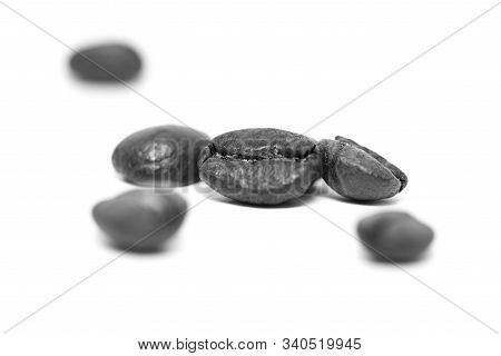 Close Up Of Coffee Beans On A White Background