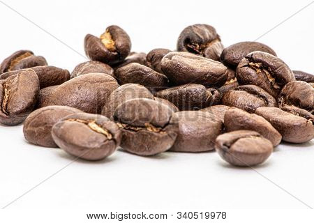 Close Up Of Coffee Beans On A White Background