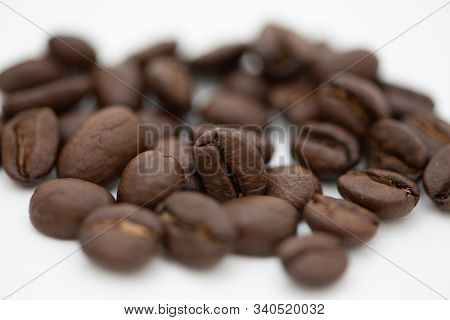 Close Up Of Coffee Beans On A White Background
