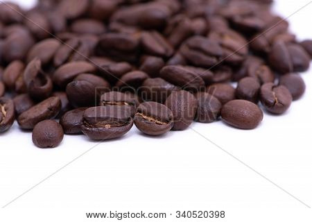 Close Up Of Coffee Beans On A White Background