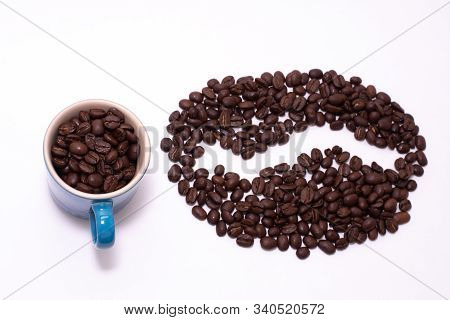 Coffee Bean Shape Created With Coffee Beans And A Mug