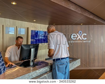 Ft. Lauderdale,fl/usa-11/1/19: A Male Passenger Inquiring And Purchasing Shore Excursions From The C