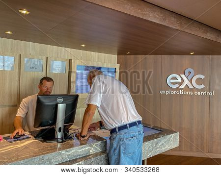 Ft. Lauderdale,fl/usa-11/1/19: A Male Passenger Inquiring And Purchasing Shore Excursions From The C