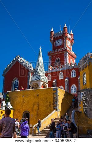 Sintra, Portugal - May, 2018: Tourists Visiting The Pena Palace A Romanticist Castle Located In Sao 