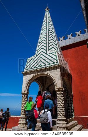 Sintra, Portugal - May, 2018: Tourists Visiting The Pena Palace A Romanticist Castle Located In Sao 