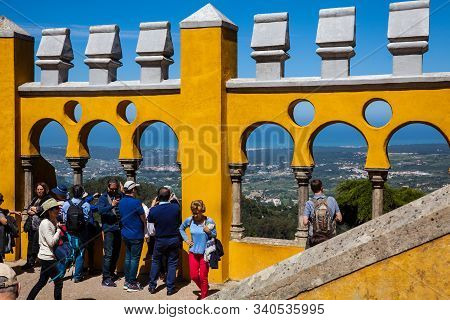 Sintra, Portugal - May, 2018: Tourists Visiting The Pena Palace A Romanticist Castle Located In Sao 