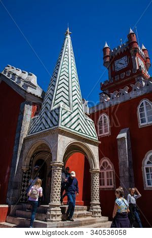 Sintra, Portugal - May, 2018: Tourists Visiting The Pena Palace A Romanticist Castle Located In Sao 