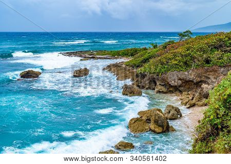 Beautiful Tropical Caribbean Island Landscape View. Scenic Summer Vacation Ocean Coast Cliffs Settin