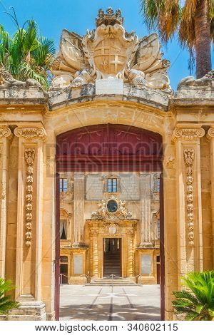The Entrance Arch Leading To The Forecourt Of The Vilhena Palace In Mdina, Malta, Europe.