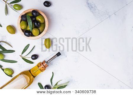 Glass Bottle With Extra Virgin Olive Oil, Fresh And Matinated Olives