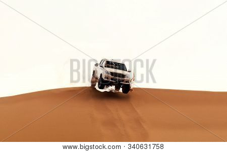 Zahedan, Baluchestan / Iran - Sep 12 2018 : Toyota Hilux Jumping In The Desert