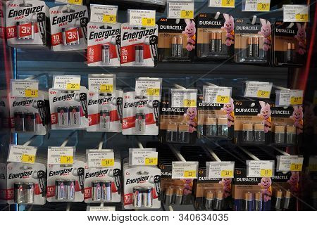 Energizer, Duracell, Eveready Aaa, Aa Batteries Displayed For Sale. Batteries Of Different Sizes In 